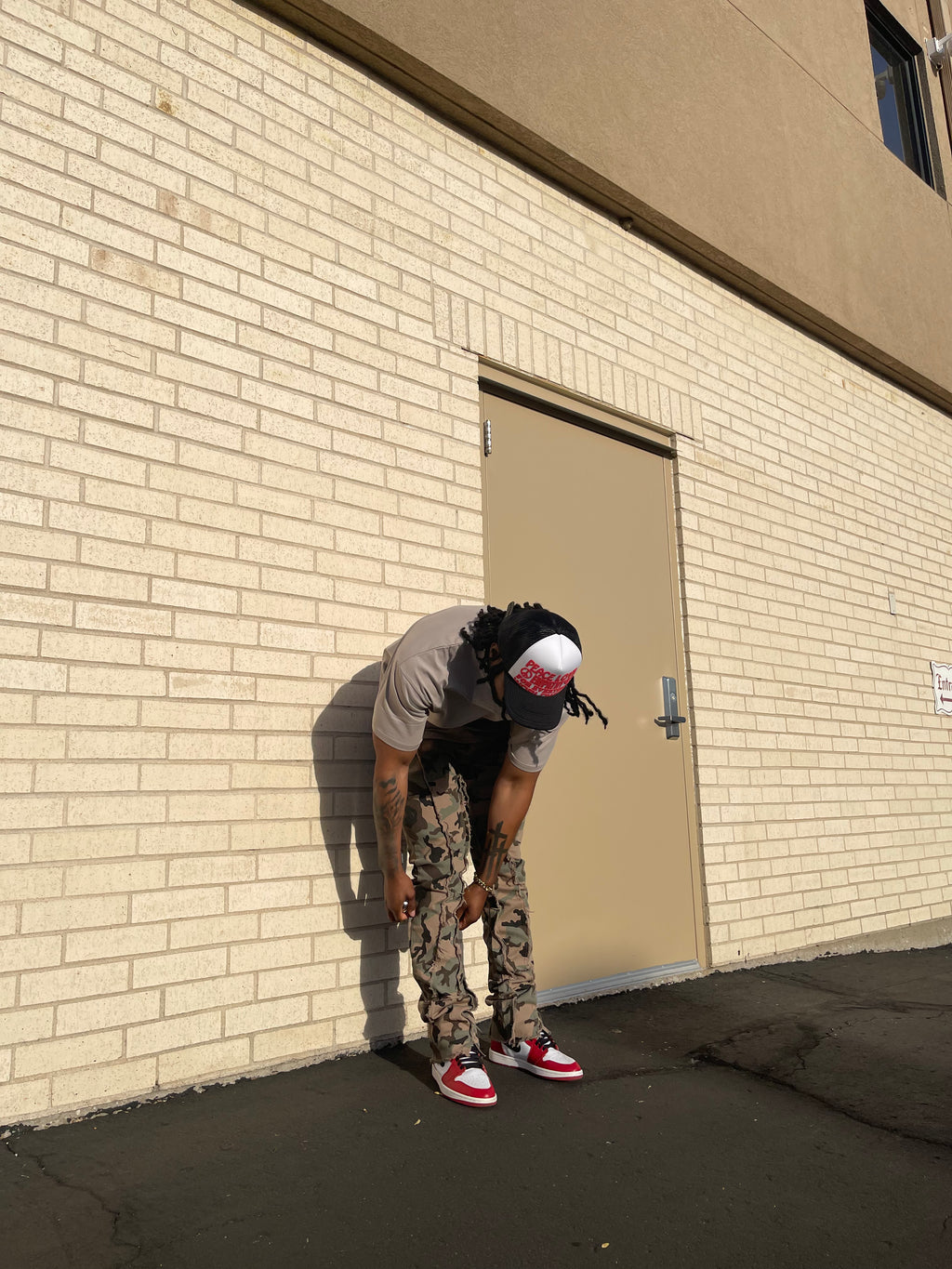 Raw Edge Stacked Camo Jeans