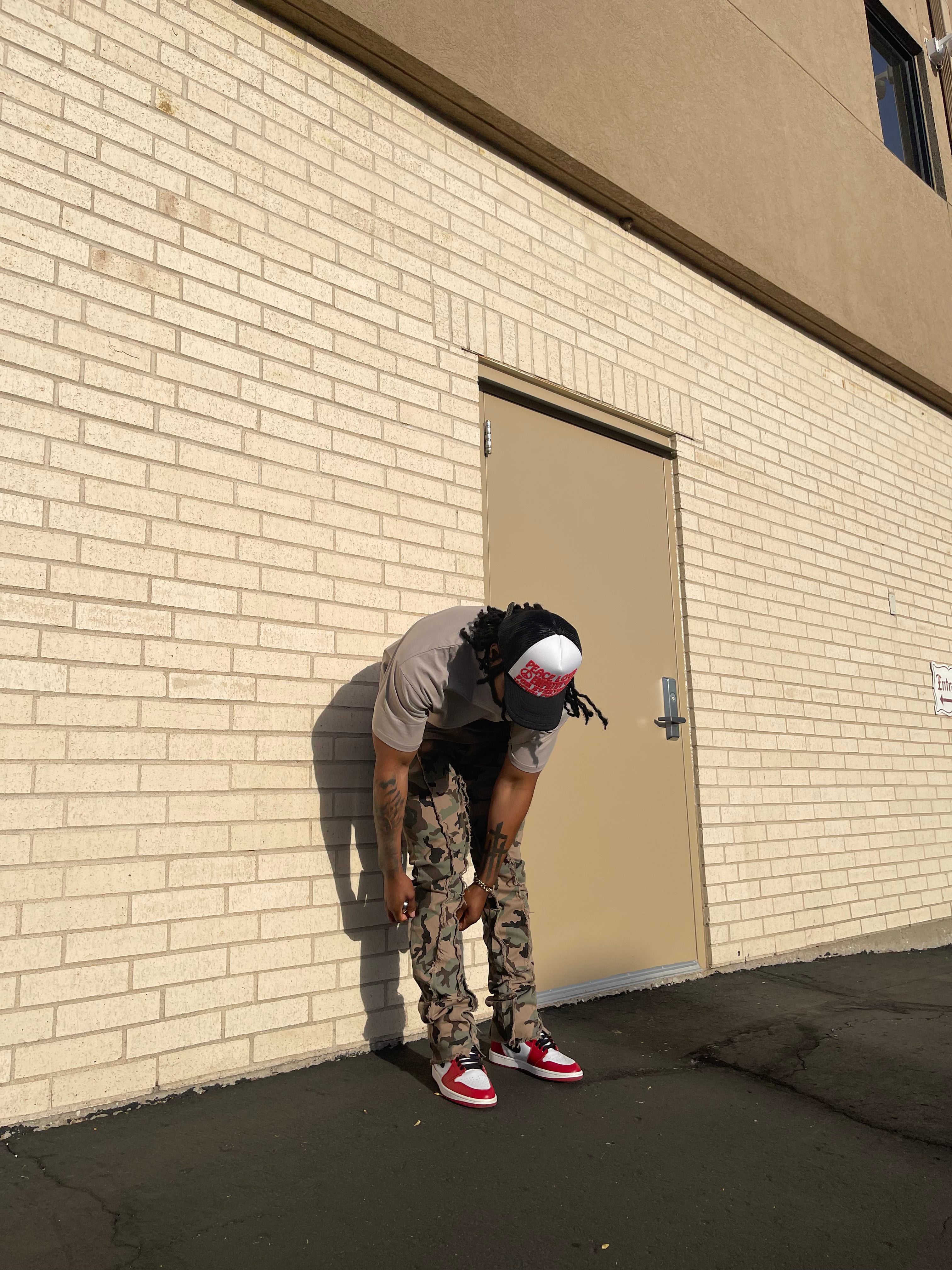 Raw Edge Stacked Camo Jeans