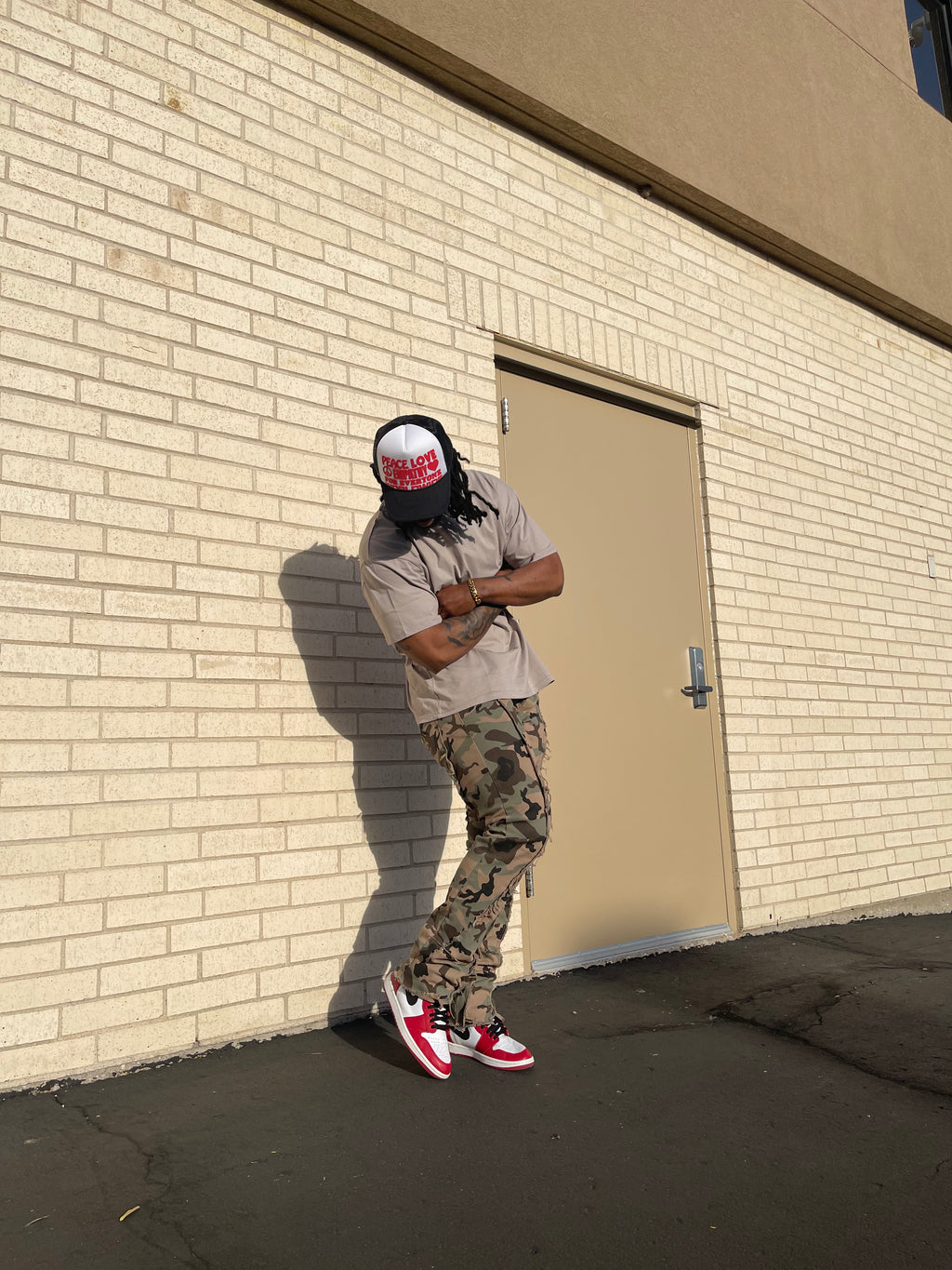 Raw Edge Stacked Camo Jeans