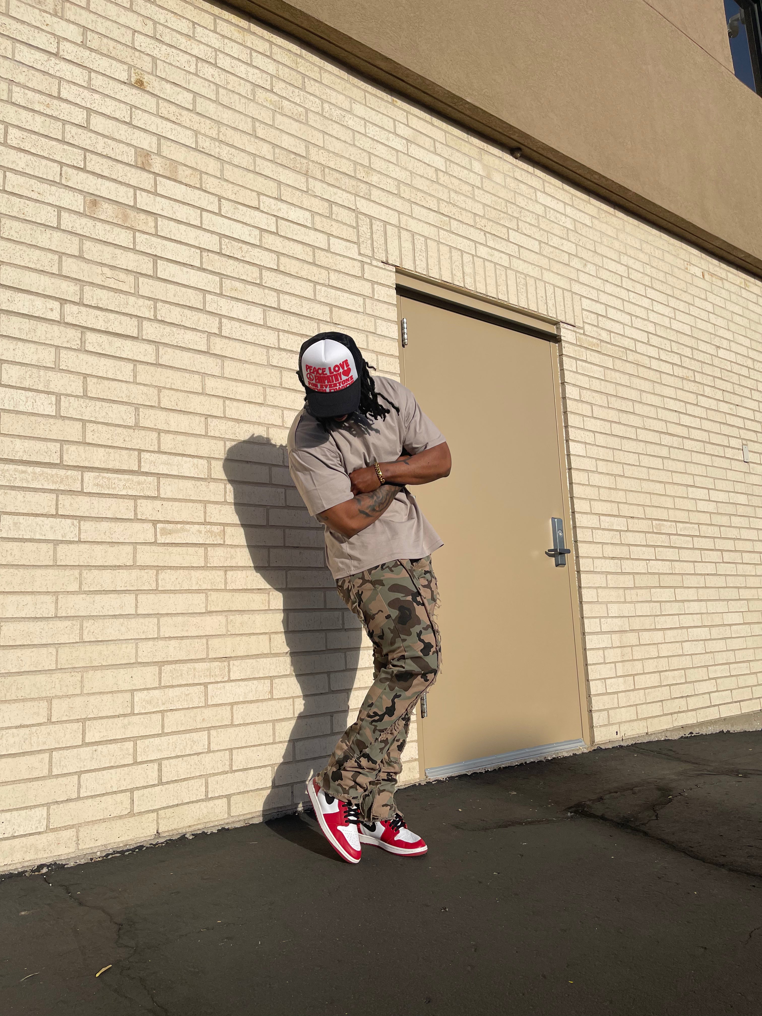 Raw Edge Stacked Camo Jeans